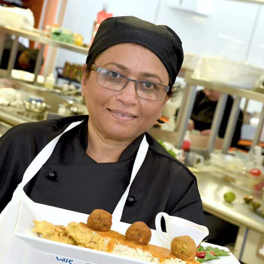Aashna House chef with one of her dishes
