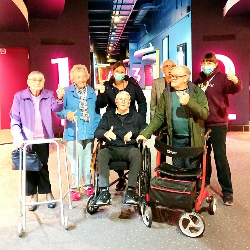 Residents and staff from Regent care home at the cinema